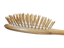 Load image into Gallery viewer, In our line, we use wooden ball tipped or non tipped bristles which we call cone bristles. The different shapes provide a solution for different types of hair. Our Cone Bristles is added when your hair type needs that extra “oomph” to detangle or to reach your scalp for a stimulating and energizing brush treatment. 
