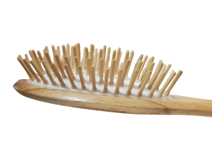 In our line, we use wooden ball tipped or non tipped bristles which we call cone bristles. The different shapes provide a solution for different types of hair. Our Cone Bristles is added when your hair type needs that extra “oomph” to detangle or to reach your scalp for a stimulating and energizing brush treatment. 